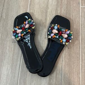 Excellent condition black rhinestone slip on flats